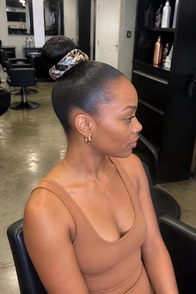 Sleek Bun with a Scarf Wrap hairstyle