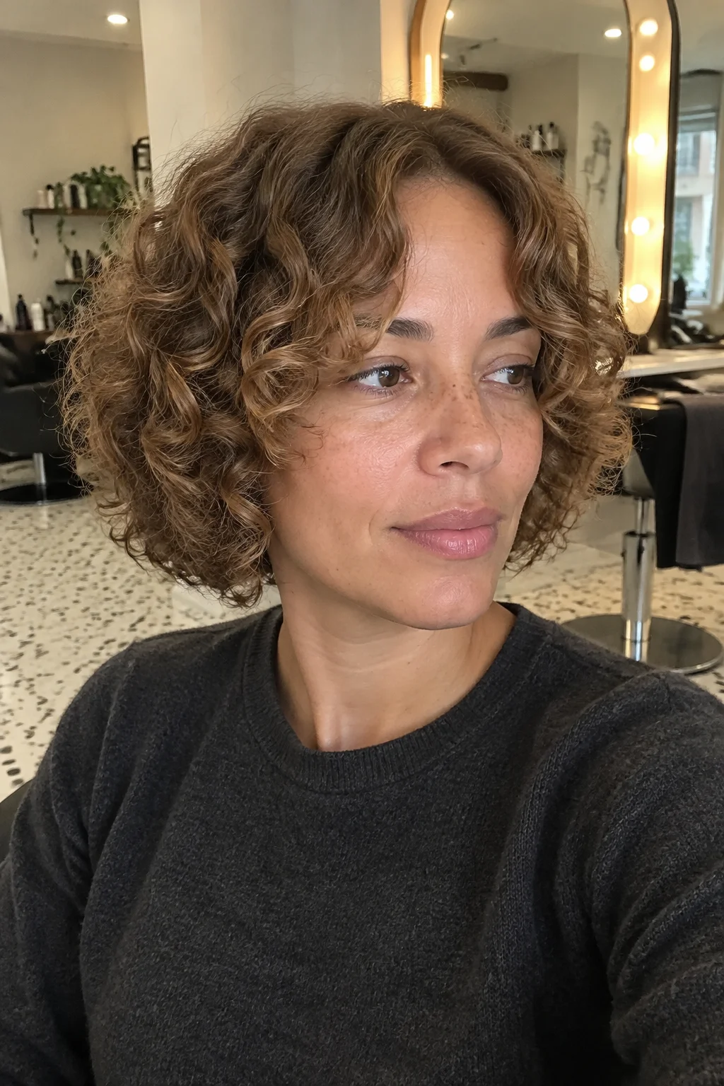 Curly Bob with Curtain Bangs hairstyle