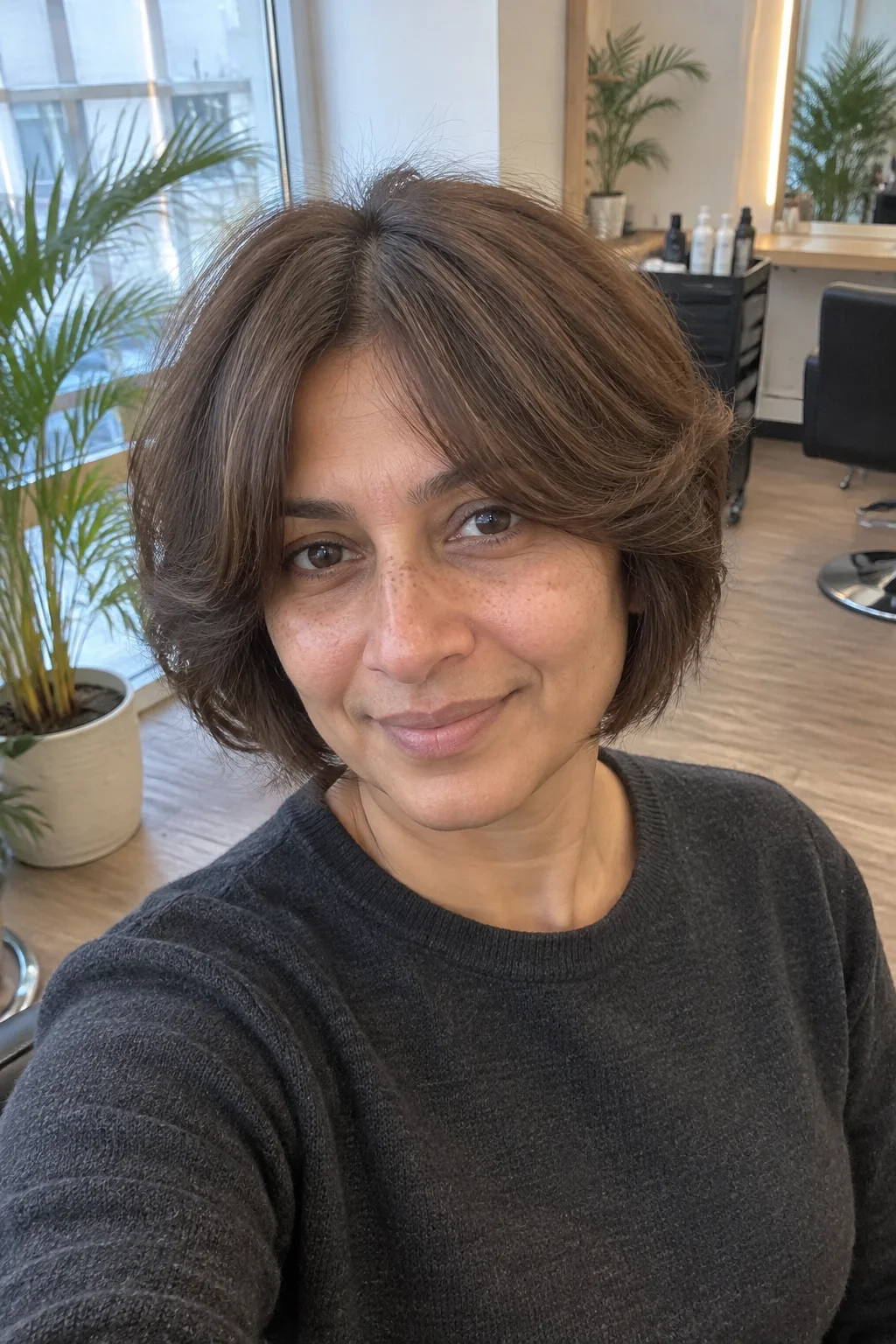 Short Layered Cut with Curtain Bangs hairstyle